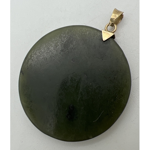 1098 - A Chinese Jade circular shaped pendant engraved with Scorpio star sign detail, on a 14ct gold bale. ... 