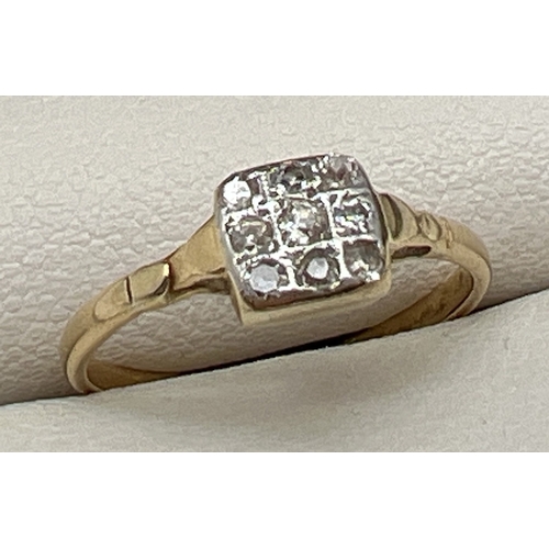 1113 - A vintage 18ct gold and diamond ring set with 9 small round cut diamonds in a square setting. Stampe... 