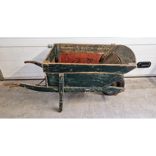 1422 - A vintage 1940's wooden wheelbarrow, painted green, with removable top section. Approx. 73cm tall x ... 