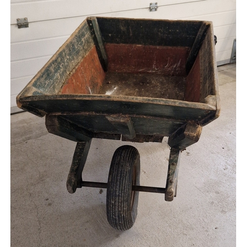 1422 - A vintage 1940's wooden wheelbarrow, painted green, with removable top section. Approx. 73cm tall x ... 