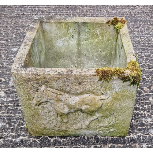 1430 - A square shaped concrete garden planter with horse design panels. Approx. 28cm tall x 33cm wide.