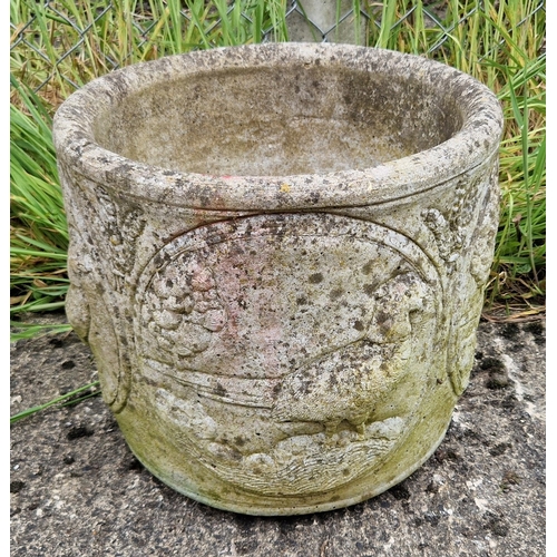 1436 - A large circular shaped concrete garden planter with panelled design showing pheasants. Approx. 35cm... 