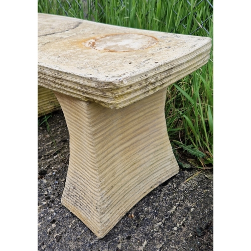 1437 - A 3 piece concrete garden bench of abstract design. Approx. 41cm tall x 92cm long.