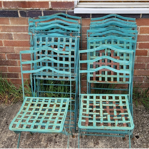 1450 - A set of 10 folding metal garden chairs, painted green, with lattice design seats.