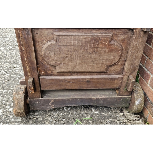 1462 - A large vintage wooden trough on wheels, possibly a day bed with head support missing. Approx. 80cm ... 