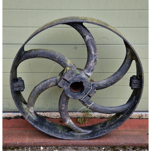 1464 - A very large and heavy antique 3 ft cast iron wheel, painted black.