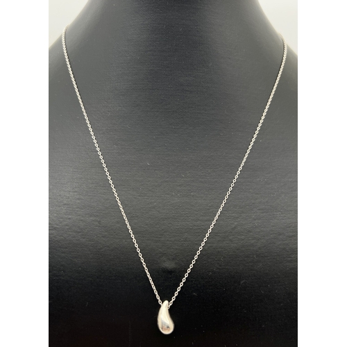 1129 - A Tiffany & Co. silver teardrop pendant necklace designed by Elsa Peretti. A solid silver teardrop, ... 