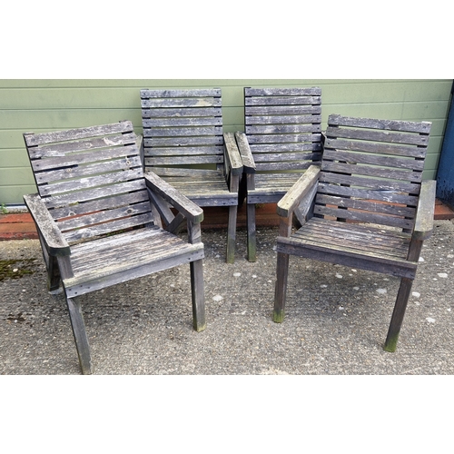 1466 - A set of 4 wooden slatted garden armchairs, each approx. 81cm tall x 61cm wide.