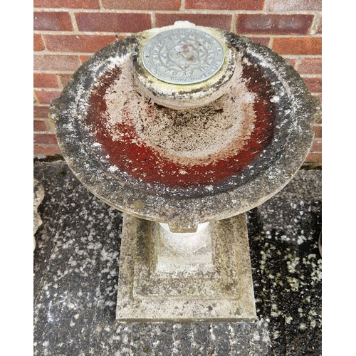 1468 - A large concrete garden bird bath with sundial (upright missing), raised on a turned pedestal with s... 