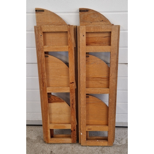 1400 - A pair of 3 tier light wood folding corner stands. Each approx. 105cm tall x 29.5cm wide. Hinge need... 