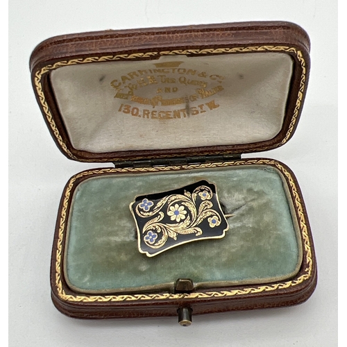 1103 - An early Victorian enamelled 18ct gold mourning brooch with woven hair panel to reverse and engraved... 