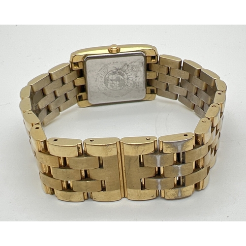 1184 - A men's Citizen Eco-Drive E010-S004012 HST wristwatch. Square gold tone stainless steel case and str... 