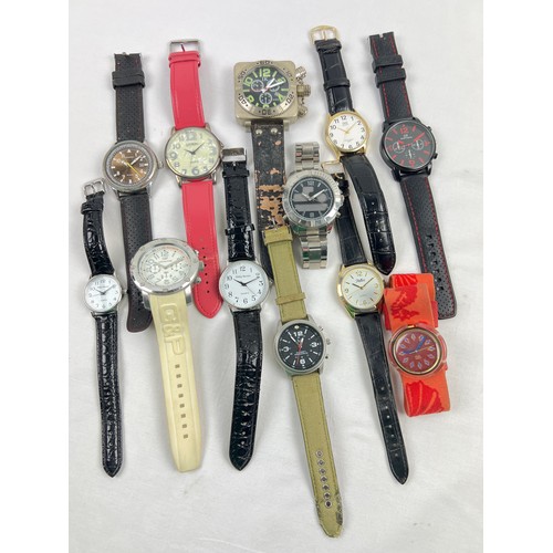 1201 - A collection of modern wristwatches in various designs and conditions. To include IK, Sekonda, Phili... 