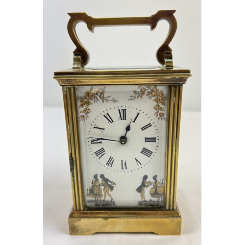 1273 - An antique French brass carriage clock with white enamel face and enameled back and side panels, dec... 