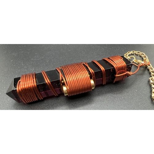 1355 - A Siberian violet quartz Etheric Weaver Healing Pendulum with wrapped copper wire, gold tone hanging... 