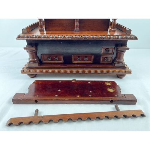 1358 - An antique rosewood large bespoke made puzzle box modelled as a castle, with several secret compartm... 