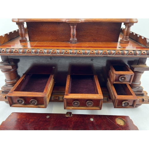 1358 - An antique rosewood large bespoke made puzzle box modelled as a castle, with several secret compartm... 