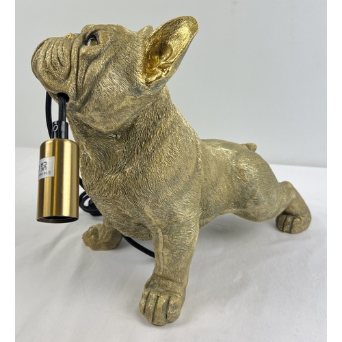 1364 - A modern gold coloured French bulldog table lamp. Approx. 27.5cm tall x 33cm long.