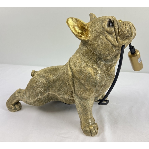 1364 - A modern gold coloured French bulldog table lamp. Approx. 27.5cm tall x 33cm long.