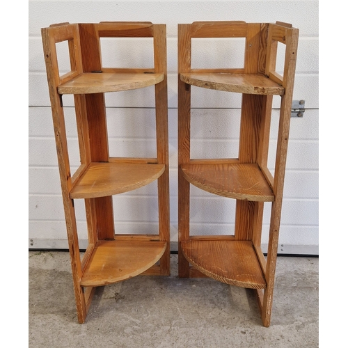 1400 - A pair of 3 tier light wood folding corner stands. Each approx. 105cm tall x 29.5cm wide. Hinge need... 