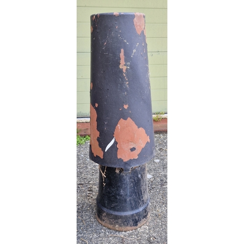 1460 - A large terracotta vortex chimney pot, painted black. Approx.  96cm tall.