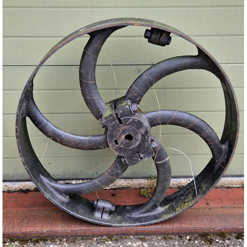 1464 - A very large and heavy antique 3 ft cast iron wheel, painted black.