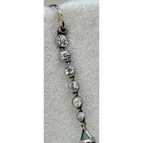 3 - A pair of white metal Art Deco diamond and jade drop earrings with hook posts. Each earring comprise... 