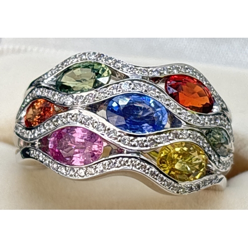 6 - An 18ct white gold multi-coloured sapphire and diamond bomb style cocktail ring from the Flamme Coll... 