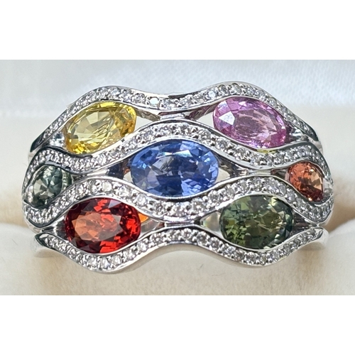 6 - An 18ct white gold multi-coloured sapphire and diamond bomb style cocktail ring from the Flamme Coll... 