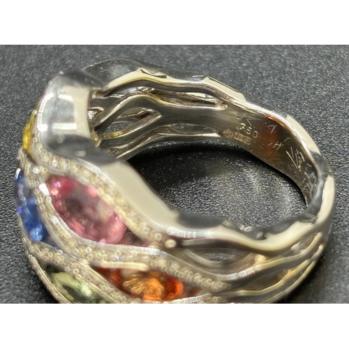 6 - An 18ct white gold multi-coloured sapphire and diamond bomb style cocktail ring from the Flamme Coll... 