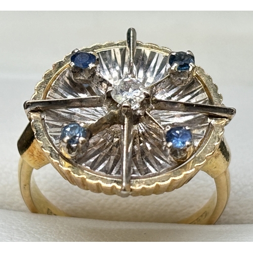 8 - A contemporary design 18ct yellow gold and platinum blue sapphire and diamond set 