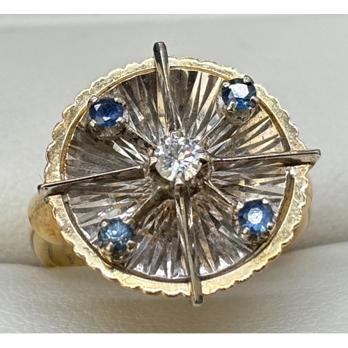 8 - A contemporary design 18ct yellow gold and platinum blue sapphire and diamond set 