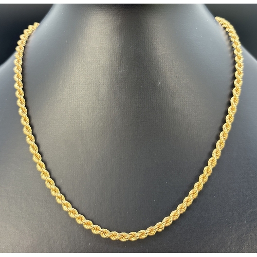 19 - A 17.5 inch 9ct gold rope chain necklace with spring ring clasp. Gold marks to fixings and clasp. To... 