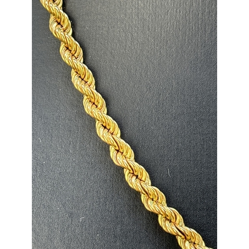 19 - A 17.5 inch 9ct gold rope chain necklace with spring ring clasp. Gold marks to fixings and clasp. To... 