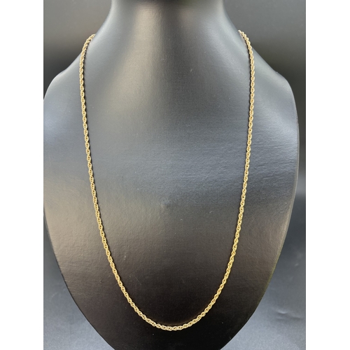 29 - A 9ct gold 24 inch rope chain necklace with spring ring clasp. Worn gold marks to clasp. Weight appr... 