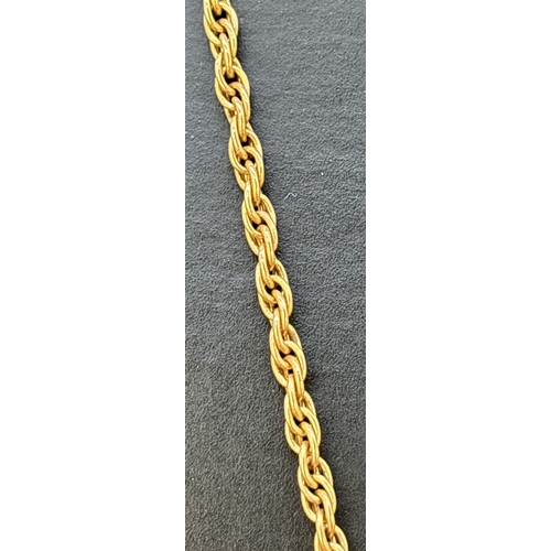 29 - A 9ct gold 24 inch rope chain necklace with spring ring clasp. Worn gold marks to clasp. Weight appr... 