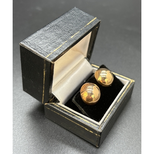 30 - A boxed pair of 9ct gold circular ball style stud earrings with butterfly backs. Each earring approx... 