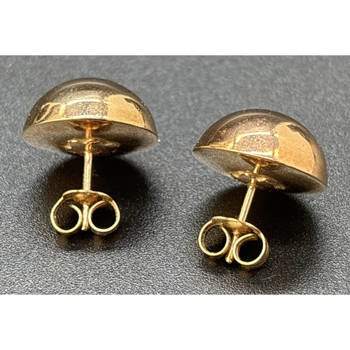 30 - A boxed pair of 9ct gold circular ball style stud earrings with butterfly backs. Each earring approx... 