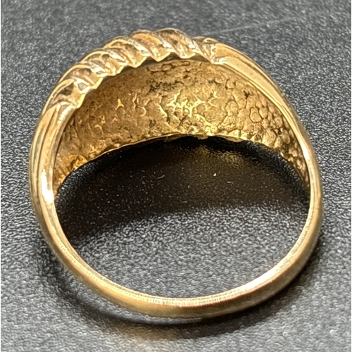 39 - A vintage 9ct gold dome style ring with ridge decoration. Fully hallmarked inside band. Ring size M.... 