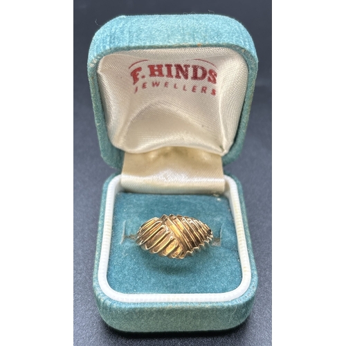 39 - A vintage 9ct gold dome style ring with ridge decoration. Fully hallmarked inside band. Ring size M.... 