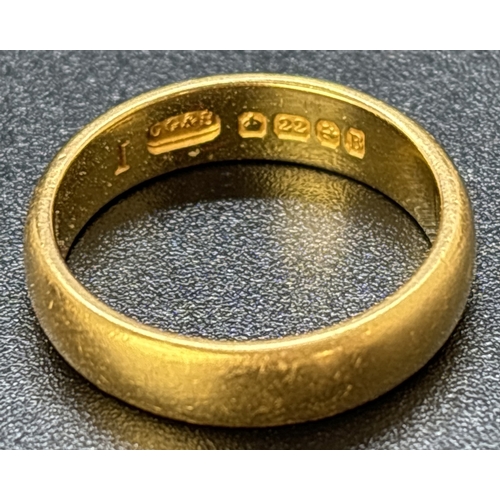 51 - A vintage 4mm wide 22ct gold wedding band. Fully hallmarked inside band. Size K. Total weight approx... 