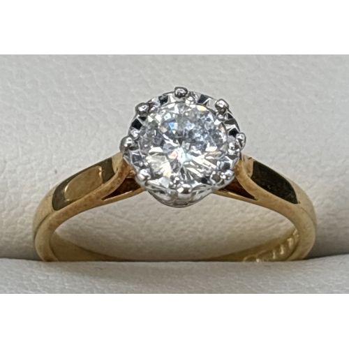 60 - A .50ct diamond solitaire ring set in 18ct yellow gold. Stone set in pierced work decorative mount w... 