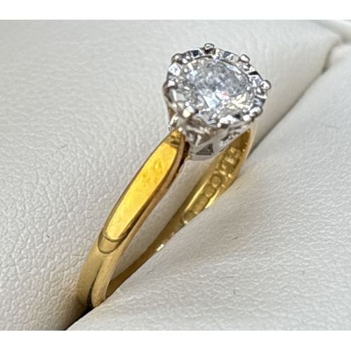 60 - A .50ct diamond solitaire ring set in 18ct yellow gold. Stone set in pierced work decorative mount w... 