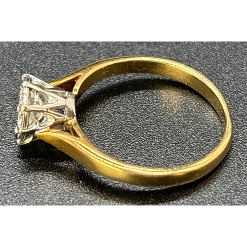 60 - A .50ct diamond solitaire ring set in 18ct yellow gold. Stone set in pierced work decorative mount w... 