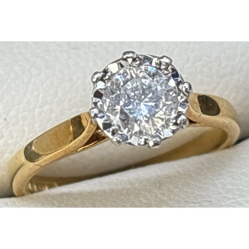 60 - A .50ct diamond solitaire ring set in 18ct yellow gold. Stone set in pierced work decorative mount w... 