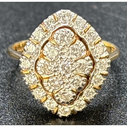 81 - A 9ct yellow gold marquise shaped diamond ring comprising a central raised panel set with 9 x 0.04ct... 