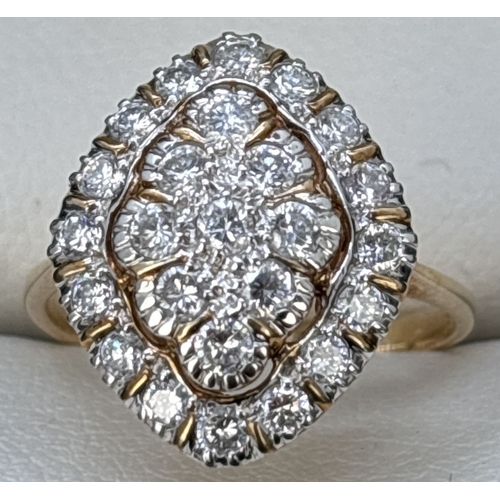 81 - A 9ct yellow gold marquise shaped diamond ring comprising a central raised panel set with 9 x 0.04ct... 