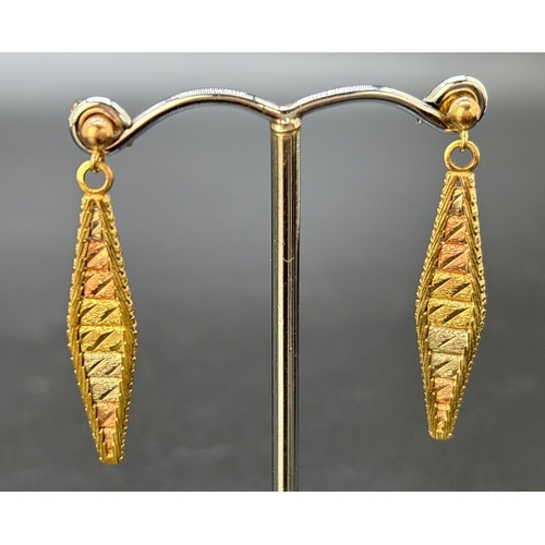 88 - A pair of vintage tri coloured 9ct gold marquise shaped drop earrings. each earring holds 9 rose, wh... 