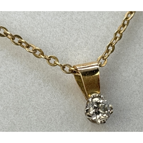 90 - An unmarked 9ct gold single stone 0.15ct diamond pendant on an 18