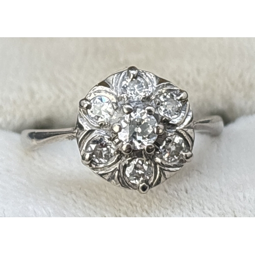 108 - A vintage 18ct gold diamond cluster ring. 7 round cut diamonds total diamond weight approx .50ct. Ra... 